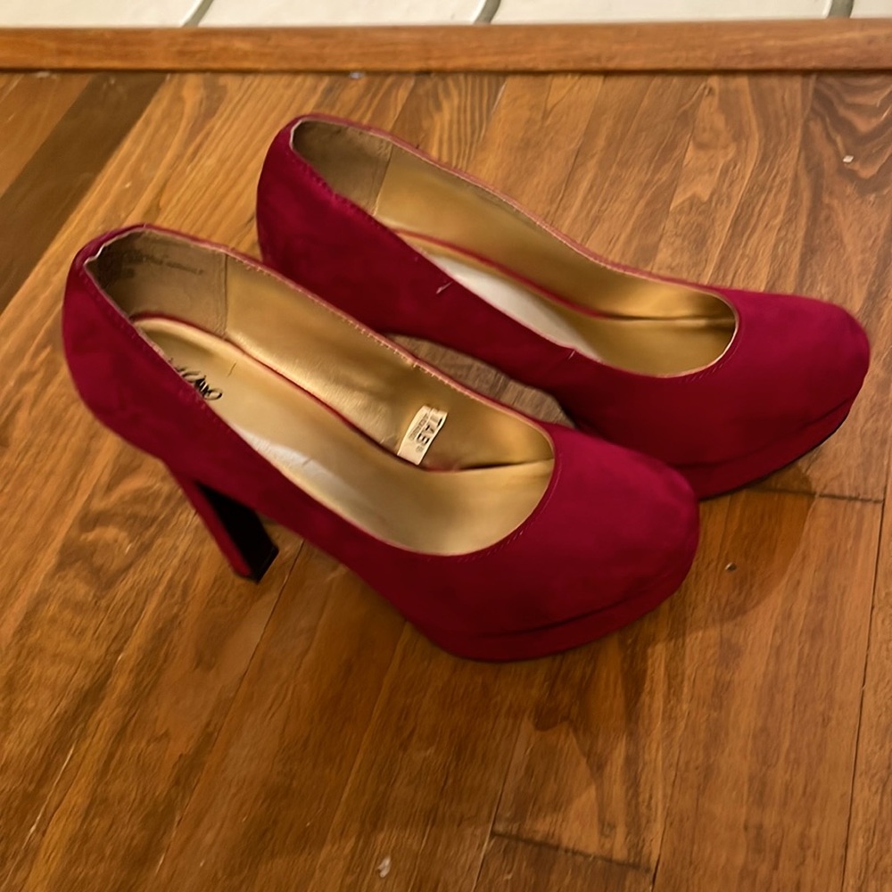 Red Suede high heel shoes.